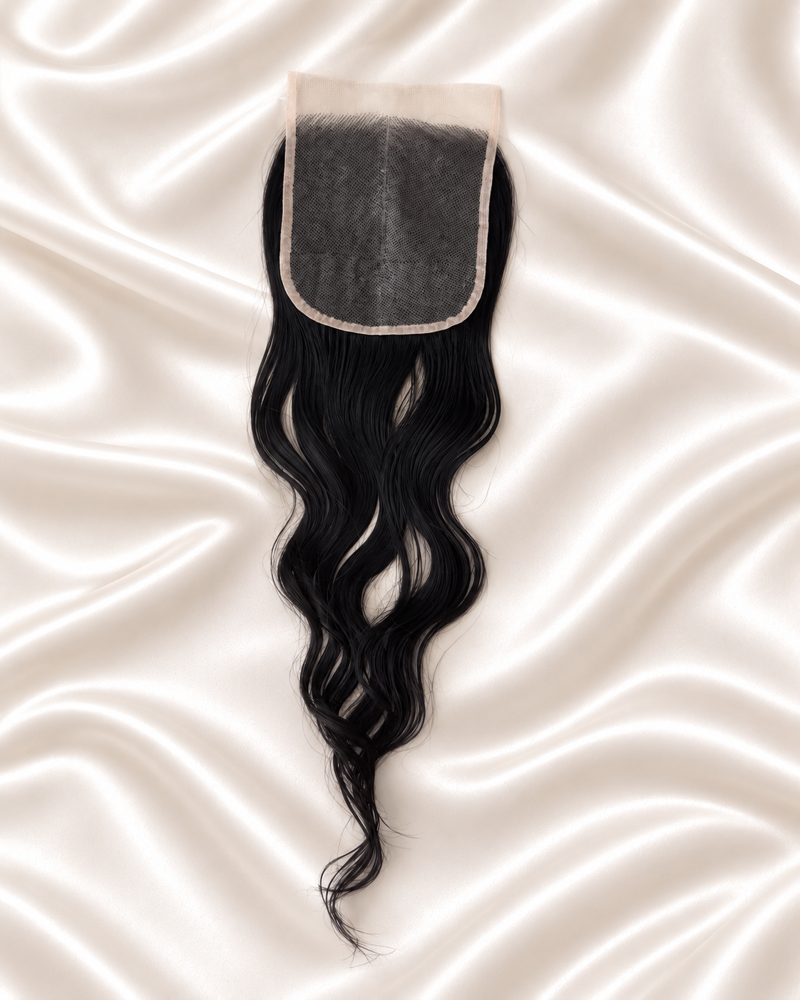 Raw Cambodian Wavy 5x5 HD lace closure on ivory satin showing lace